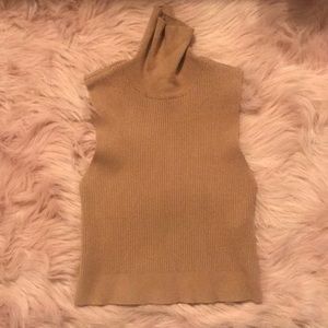 Sleeveless turtle neck!